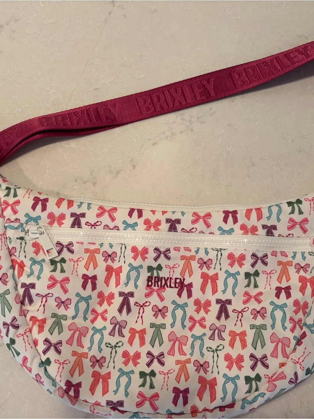 Brixley White Bow Print Bowie Cresent Crossbody Belt Bag